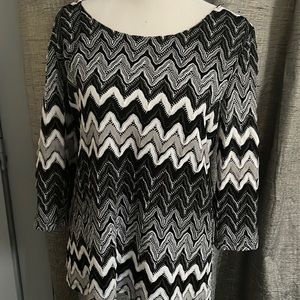 Cute little top with zipper and back